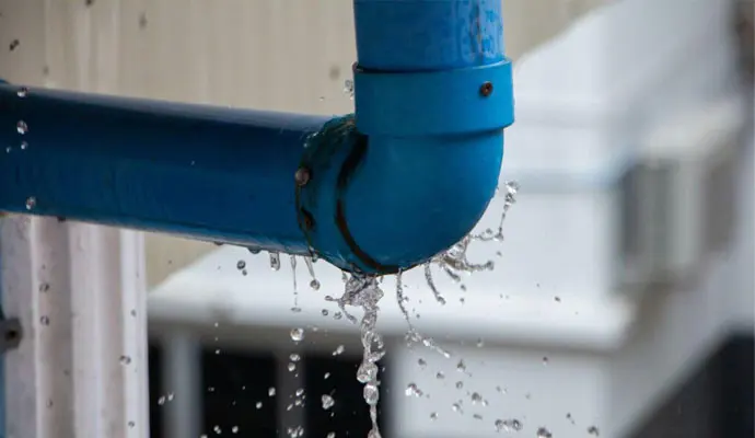 Water dripping from a leaking pipe joint during a burst pipe in Pueblo, CO